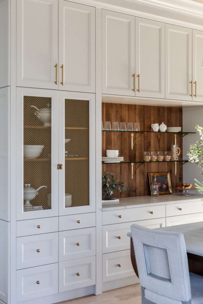 custom white kitchen with walnut accents