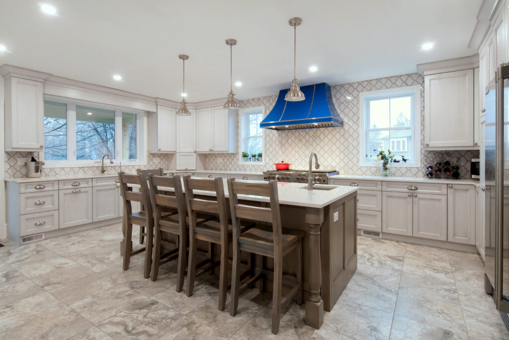 kitchen with blue stove and range hood