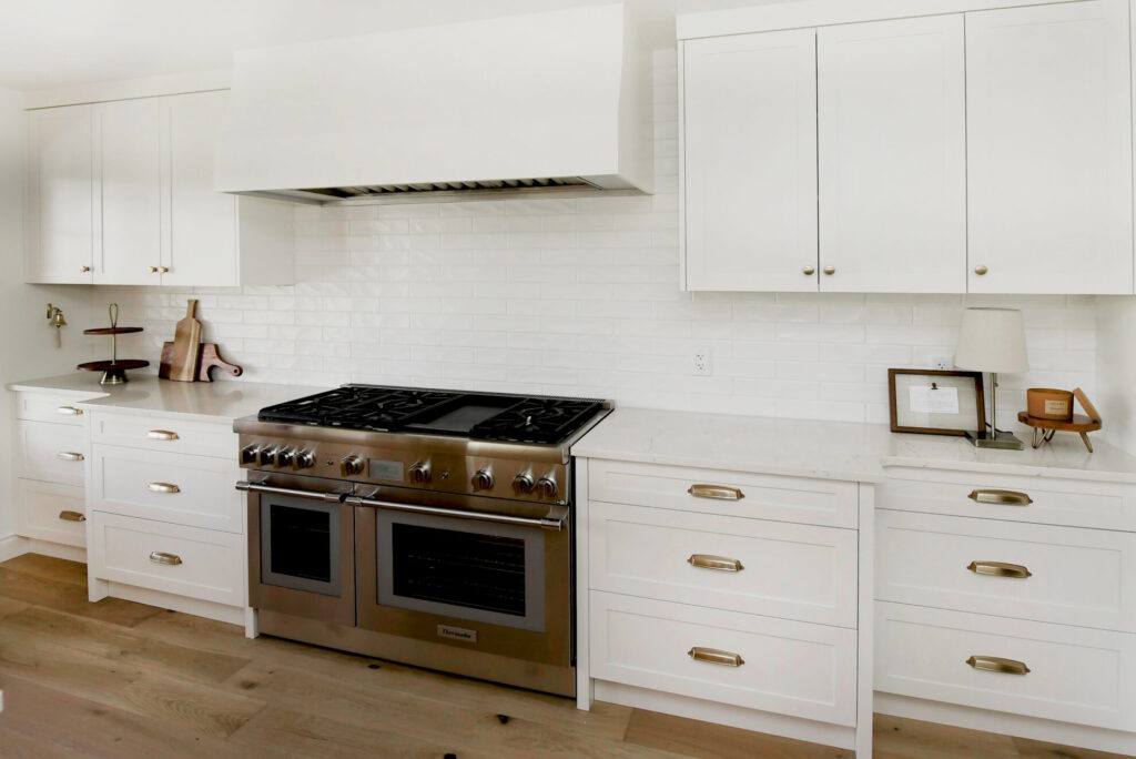 white cabinets with gold hardware