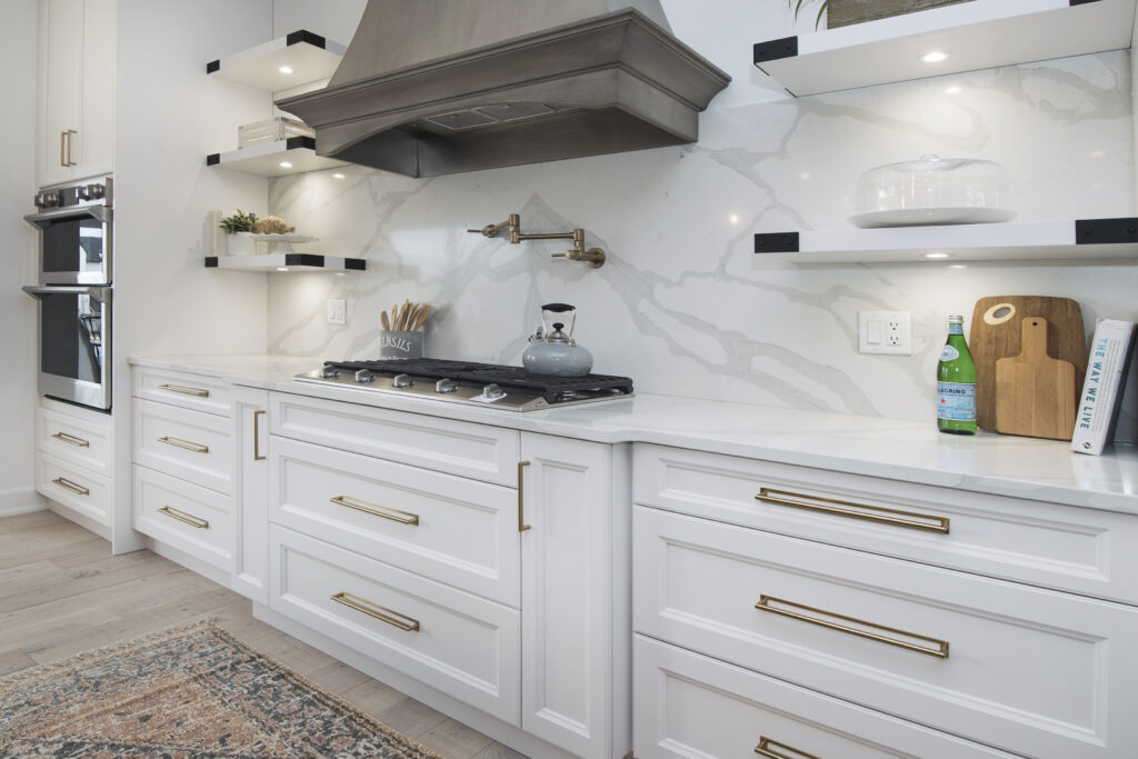 white cabinets with gold hardware