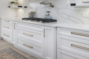 white cabinets with gold hardware