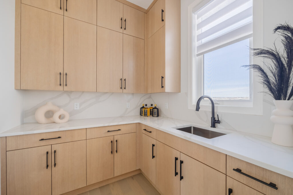 Wood cabinets with black hardware