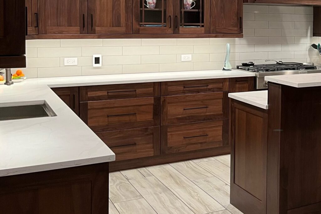 Wood cabinets with black hardware