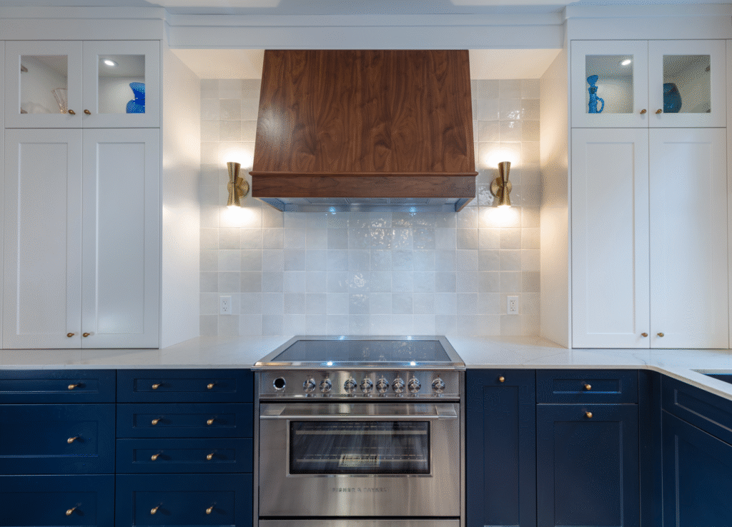 navy kitchen cabinets with gold hardware
