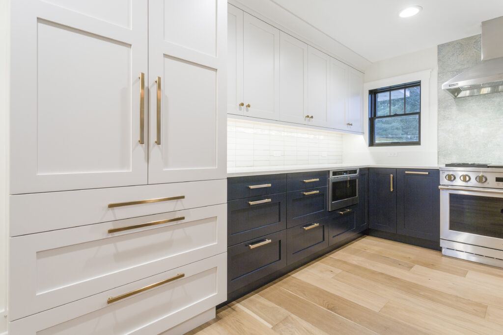 navy blue cabinets with gold hardware
