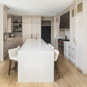 Petite Grandeur Kitchen in light greay and deep brown colour in White Rift Oak