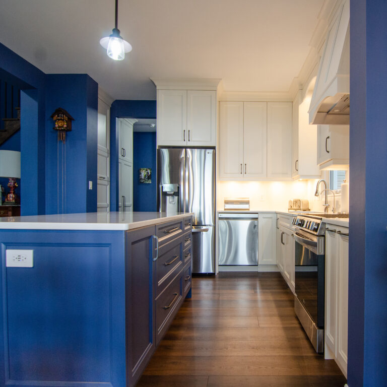 Mixing White and bright Blue kitchen with glass cabinet doors