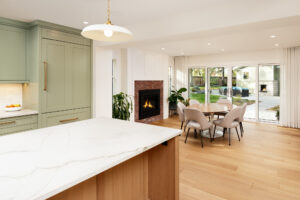 quartz countertop and cabinet pairing custom kitchen idea wood and green